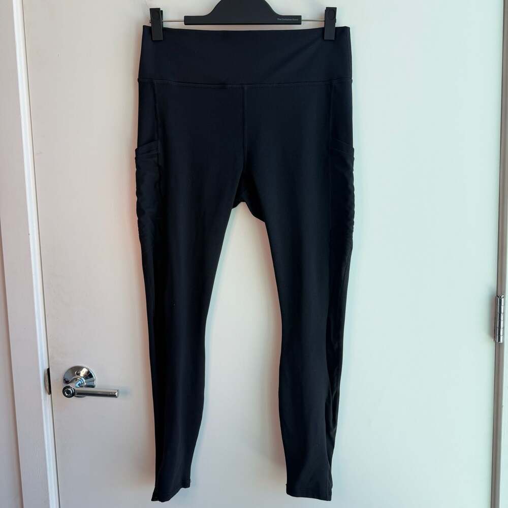 Fabletics PowerHold High-Waisted Black Leggings with Side Pockets